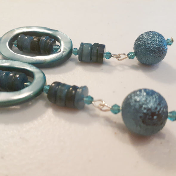 Teal Thrill Dangle Earrings